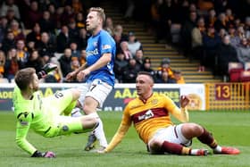 MOTHERWELL, SCOTLAND - APRIL 07: Scott Arfield of Rangers scores his team's first goal during the Scottish Ladbrokes Premiership match between Motherwell and Rangers at Fir Park on April 07, 2019 in Motherwell, Scotland. (Photo by Ian MacNicol/Getty Images)