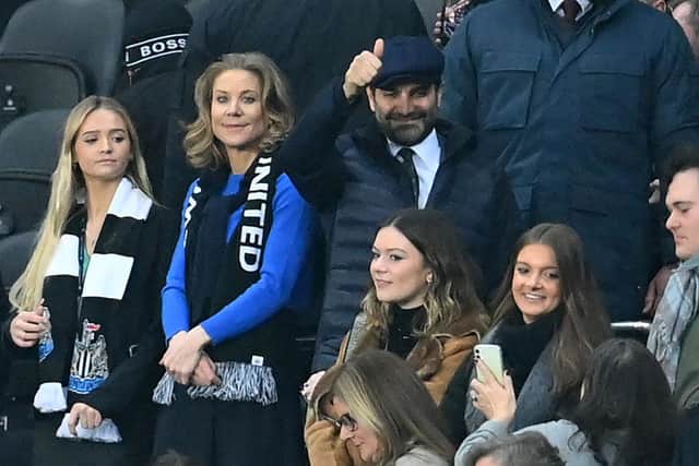 Newcastle United's English minority owner Amanda Staveley (2nd L) and her husband Mehrdad Ghodoussi (C) take their seats for the English Premier League football match between Newcastle United and Manchester United at St James' Park in Newcastle-upon-Tyne, north east England on December 27, 2021. -(Photo by PAUL ELLIS/AFP via Getty Images)