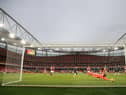 Pierre-Emerick Aubameyang of Arsenal scores their team's first goal past Illan Meslier of Leeds United. (Photo by Adam Davy - Pool/Getty Images)