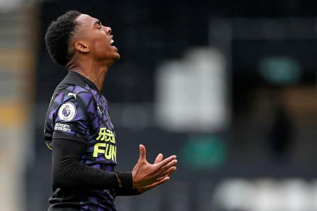 Newcastle United's English midfielder Joe Willock celebrates scoring the opening goal during the English Premier League football match between Fulham and Newcastle United at Craven Cottage in London on May 23, 2021.
