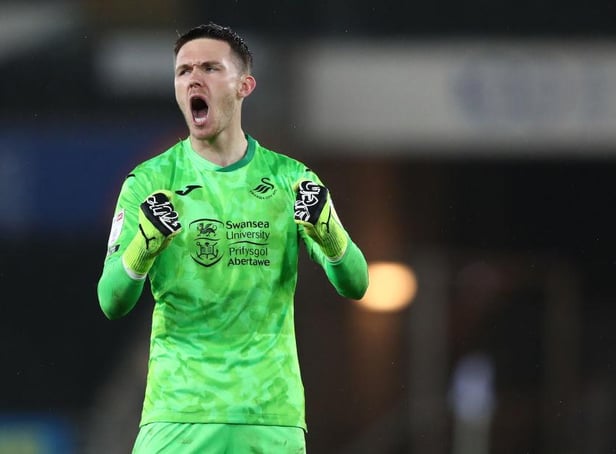 Freddie Woodman celebrates Swansea City's win over Nottingham Forest.