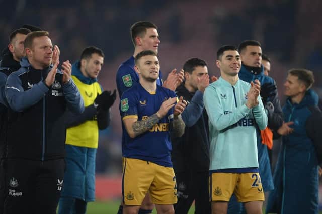Newcastle United's Kieran Trippier, centre, applauds fans on Tuesday night.