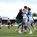 Bristol Rovers fans swarm Anthony Evans following his side's seventh goal during the Sky Bet League Two match at the Memorial Stadium, Bristol. Picture date: Saturday May 7, 2022.