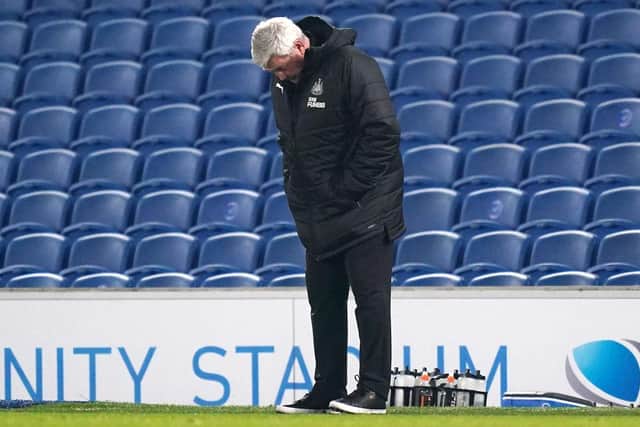 Newcastle United's English head coach Steve Bruce looks on during the English Premier League football match between Brighton and Hove Albion and Newcastle United at the American Express Community Stadium in Brighton, southern England on March 20, 2021.