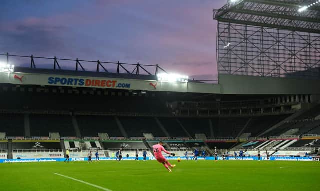 A general view of the sun setting behind St James' Park, from the Leazes end of the stadium during the second half of the Premier League match between Newcastle United and Leicester City at St. James Park on January 03, 2021 in Newcastle upon Tyne, England.