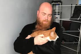 Ginger the cat is reunited in South Shields with relieved owner Daniel.