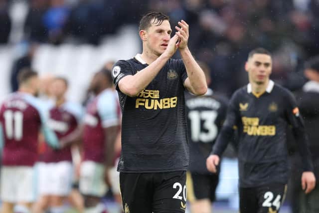 Chris Wood of Newcastle United applauds fans after their sides draw during the Premier League match between West Ham United and Newcastle United at London Stadium on February 19, 2022 in London, England. (Photo by Warren Little/Getty Images)