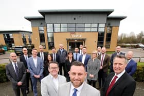 Castle's technical director, Simon Groom, managing director, Andrew Dawson and CEO, Tony Lister, with members of the senior management team.