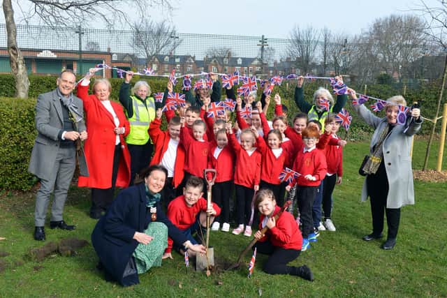 Deputy Lord Lieutenant Susan Wear along with children from Jarrow Cross C of E Primary School plant two saplings at Jarrow Park ahead of Queen's Jubilee.
