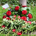 Flowers laid at a previous Workers Memorial Day commemoration service.