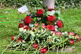 Flowers laid at a previous Workers Memorial Day commemoration service.