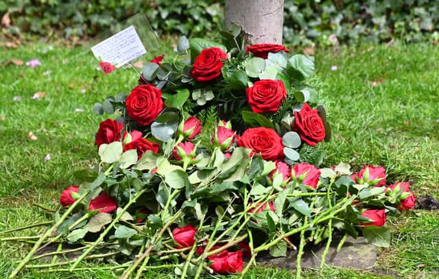 Flowers laid at a previous Workers Memorial Day commemoration service.