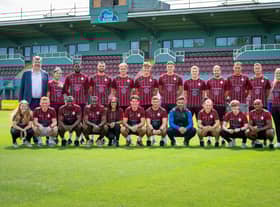 South Shields men and women's teams pose in the new home kit