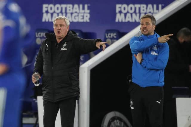 Newcastle United's English head coach Steve Bruce (L) gestures during the English Premier League football match between Leicester City and Newcastle United at King Power Stadium in Leicester, central England on May 7, 2021.