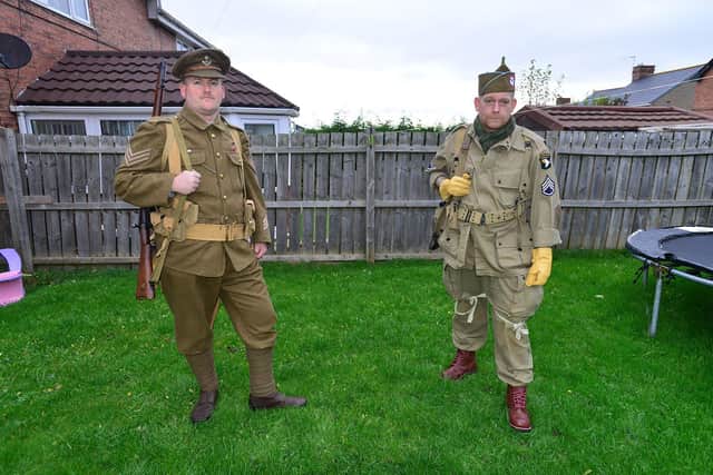 Army veteran Trevor Gray (left) in the uniform of the Durham Light Infantry 1914-1918 along with fellow army veteran Kevin Merritt in a USA Airborne uniform from 1942-1945 who are walking from Seaham to South Shields to raise funds for the charity Veterans at Ease . Picture by FRANK REID