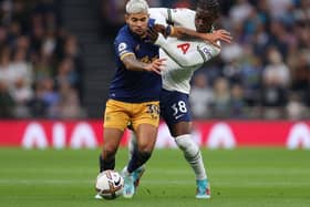 Yves Bissouma of Tottenham Hotspur battles for possession with Newcastle United's Bruno Guimaraes, who became a father last week.