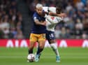 Yves Bissouma of Tottenham Hotspur battles for possession with Newcastle United's Bruno Guimaraes, who became a father last week.
