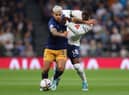 Yves Bissouma of Tottenham Hotspur battles for possession with Newcastle United's Bruno Guimaraes, who became a father last week.