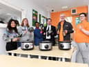 David Pearson (centre), manager at Newcastle Building Society's South Shields branch, with members of the Hospitality & Hope team, including chief executive officer Brian Thomas (one from right).