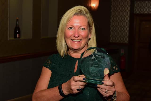 Angela Todd with the Greener South Tyneside Award which Litter & Laugh Walk won in 2019.