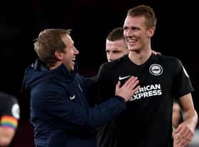 Head coach Graham Potter of Brighton celebrates with Dan Burn of Brighton after winning the Premier League match between Arsenal FC and Brighton & Hove Albion at Emirates Stadium on December 05, 2019 in London, United Kingdom. (Photo by Mike Hewitt/Getty Images)