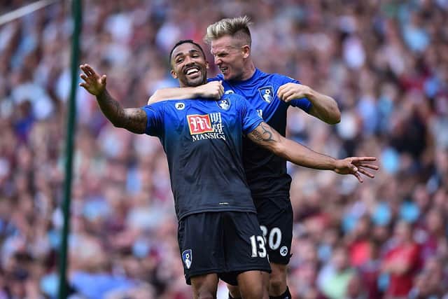 Callum Wilson and Matt Ritchie during their Bournemouth days. (Photo credit should read BEN STANSALL/AFP via Getty Images)