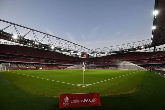 The pitch is watered ahead of the English FA Cup third round football match between Arsenal and Newcastle United at the Emirates Stadium in London on January 9, 2021. (Photo by Glyn KIRK / AFP) / RESTRICTED TO EDITORIAL USE.