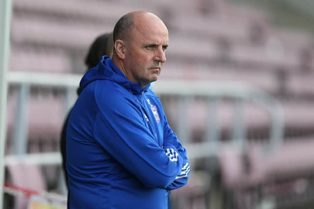 Ipswich Town manager Paul Cook looks on prior to the Sky Bet League One match between Northampton Town and Ipswich Town.