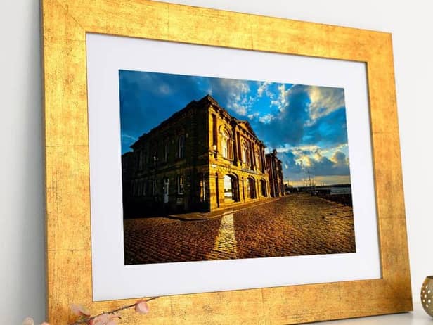 John is raising money for The Customs House with sales of his print.