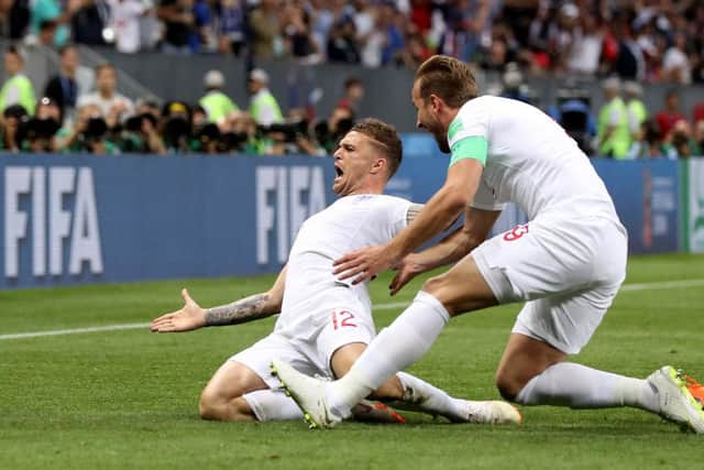 Kieran Trippier of England celebrates with team mate Harry Kane after scoring his team's first goal during the 2018 FIFA World Cup Russia Semi Final match between England and Croatia at Luzhniki Stadium on July 11, 2018 in Moscow, Russia. (Photo by Ryan Pierse/Getty Images)