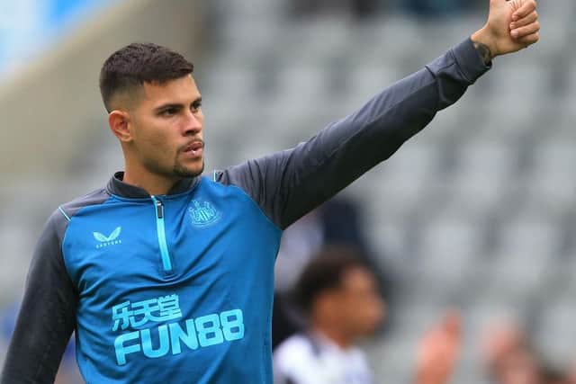 Newcastle United's Brazilian midfielder Bruno Guimaraes applauds the fans following the English Premier League football match between Newcastle United and AFC Bournemouth at St James' Park in Newcastle-upon-Tyne, north east England on September 17, 2022. (Photo by LINDSEY PARNABY/AFP via Getty Images)
