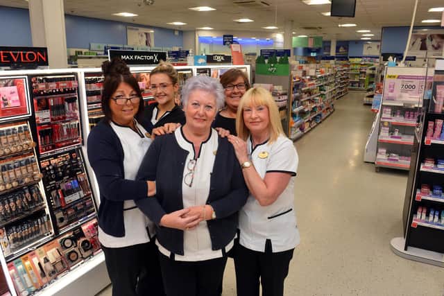 Mavis Betts with her colleagues at Boots in King Street, where she is about to retire after 36 years.