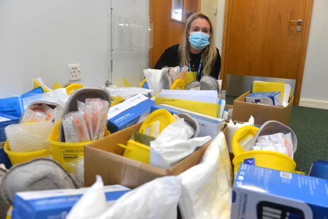 Community pharmacist Louise Lydon with the vaccination preparation kit to visit housebound patients.