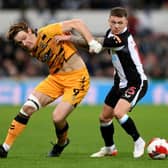 Kieran Trippier of Newcastle United challenges Joe Ironside of Cambridge United during the Emirates FA Cup Third Round match between Newcastle United and Cambridge United at St James' Park on January 08, 2022 in Newcastle upon Tyne, England. (Photo by Stu Forster/Getty Images)