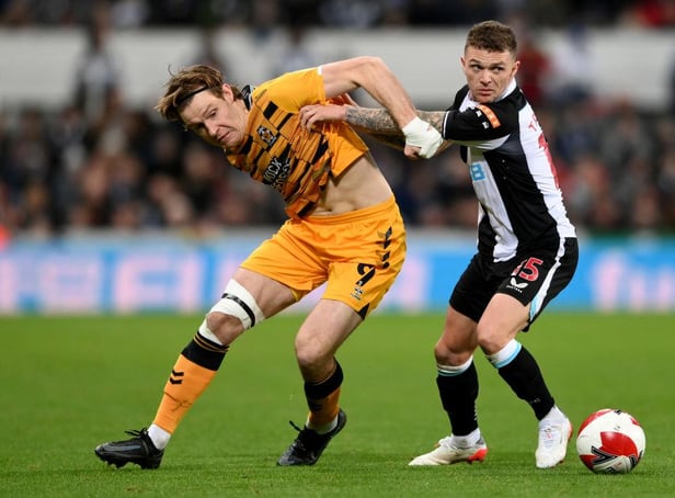 Kieran Trippier of Newcastle United challenges Joe Ironside of Cambridge United during the Emirates FA Cup Third Round match between Newcastle United and Cambridge United at St James' Park on January 08, 2022 in Newcastle upon Tyne, England. (Photo by Stu Forster/Getty Images)