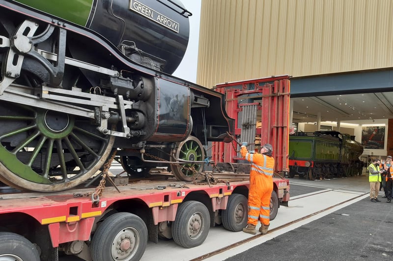 Engineers get Green Arrow ready to get off the lorry outside Doncaster Museum