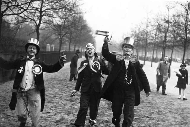Avid and expectant fans of Sheffield United bring their high spirits to the Mall in London on the morning of their team's appearance in the 1936 FA Cup final against Arsenal at Wembley.