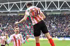 Ross Stewart celebrates his second goal at the DW Stadium