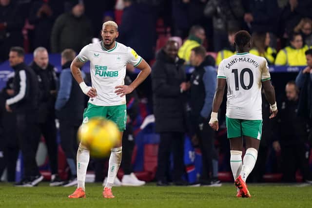 Newcastle United's Joelinton and Allan Saint-Maximin react after the Premier League match against Crystal Palace at Selhurst Park.