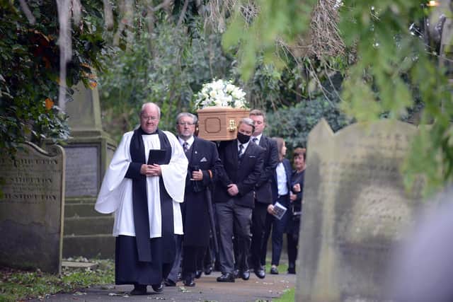 The cortege arrives at the church