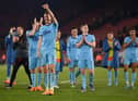 Dan Burn and his team-mates celebrate Newcastle United's win over Southampton.