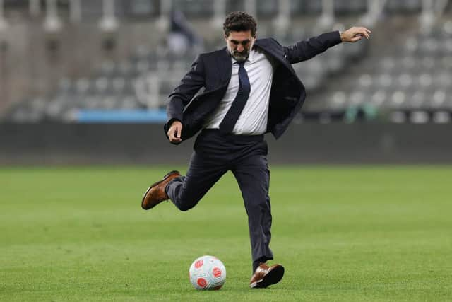 Yasir Al-Rumayyan, Chairman of Newcastle United and PIF plays football on the pitch after the Premier League match between Newcastle United and Crystal Palace at St. James Park on April 20, 2022 in Newcastle upon Tyne, England. (Photo by Ian MacNicol/Getty Images)