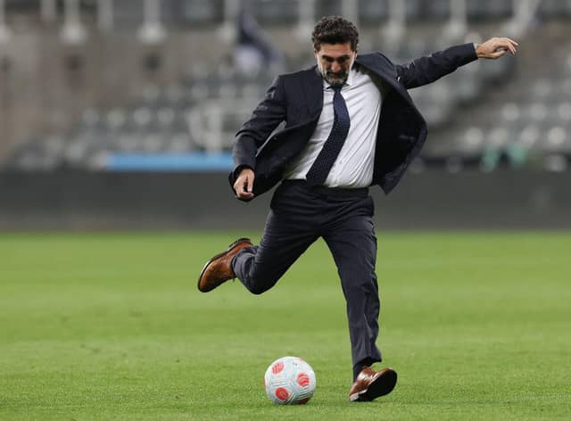 Yasir Al-Rumayyan, Chairman of Newcastle United and PIF plays football on the pitch after the Premier League match between Newcastle United and Crystal Palace at St. James Park on April 20, 2022 in Newcastle upon Tyne, England. (Photo by Ian MacNicol/Getty Images)