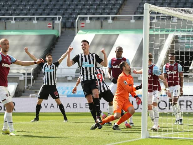 Ciaran Clark of Newcastle United celebrates after his teammate Joelinton scored their side's second goal during the Premier League match between Newcastle United and West Ham United at St. James Park on April 17, 2021 in Newcastle upon Tyne, England.