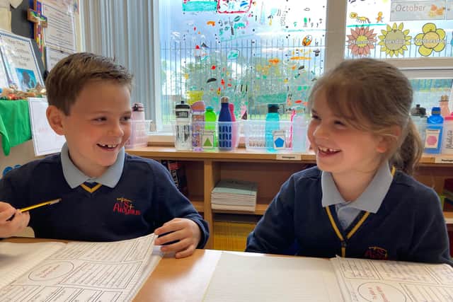 St Aloysius Catholic Junior School Academy pupils Owen Brown and Isobel Hopper. The school was praised by Ofsted for its caring ethos.