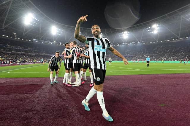 Newcastle United striker Callum Wilson celebrates scoring his second goal.