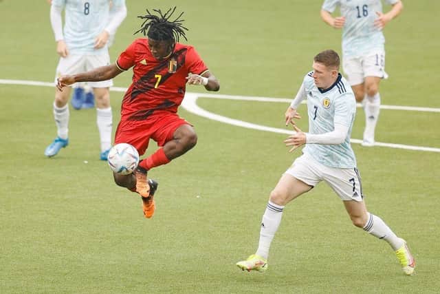 Belgium's Johan Bakayoko and Scotland's Elliot Anderson fight for the ball during a soccer game between the U21 teams of Belgium and Scotland, Sunday 05 June 2022 in Sint-Truiden, the last qualification match (out of 8) in the group I, for the 2023 Under-21 European Championships. BELGA PHOTO BRUNO FAHY (Photo by BRUNO FAHY / BELGA MAG / Belga via AFP) (Photo by BRUNO FAHY/BELGA MAG/AFP via Getty Images)