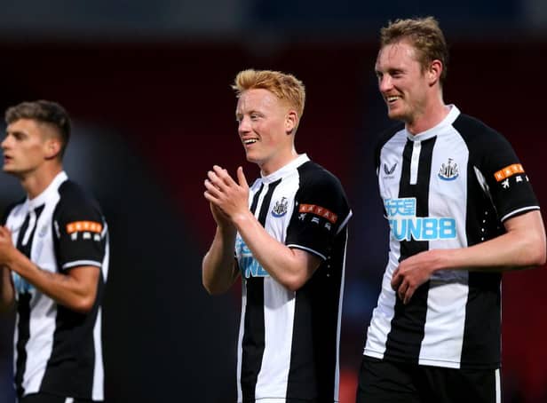 Matty Longstaff and brother Sean last summer.