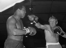 Former British Champion Richard Dunn takes on Ali in an exhibition match on Wearside in 1977.