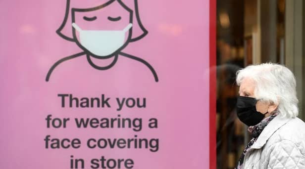 Adults have been warned to stay at home when feeling unwell or wear face coverings in public spaces in order to stem the spread of illness,
